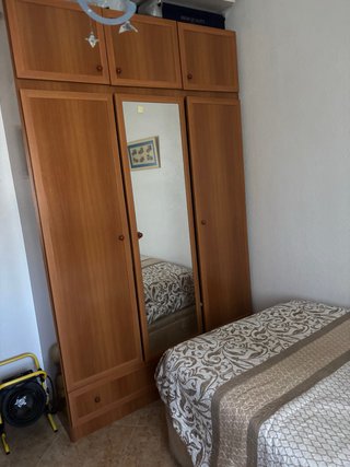 Dormitorio completo de madera