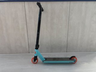 Patinete Freestyle Oxelo Turquesa y Naranja