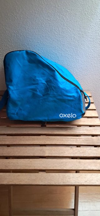 Patines Oxelo Play 3 + protecciones + bolsa.