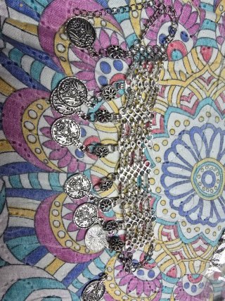 Pulsera de plata con monedas