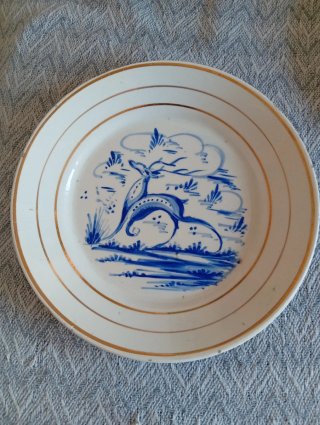 Plato de cerámica vintage azul y dorado