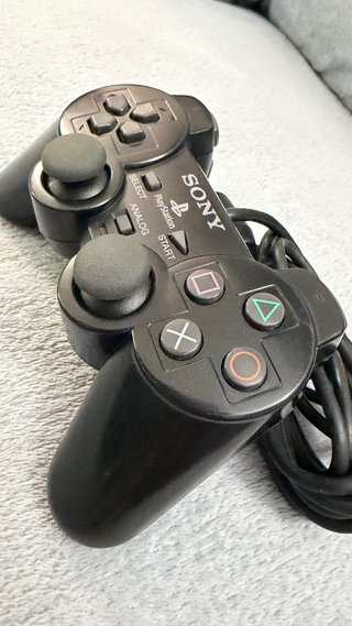 PlayStation 2 Nera + Accessori