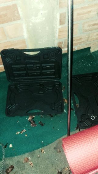 Juego de pesas con barra y esterilla