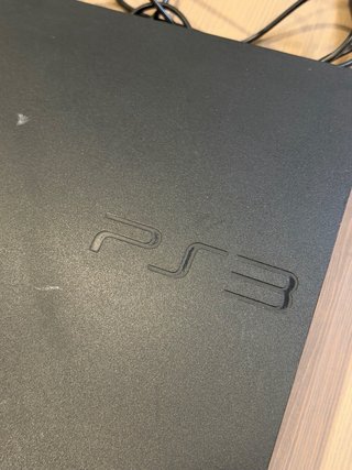 Consola Sony PS3 Slim + 2 mandos