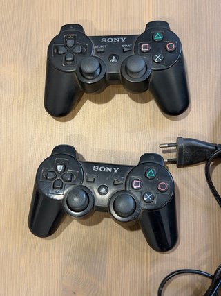Consola Sony PS3 Slim + 2 mandos