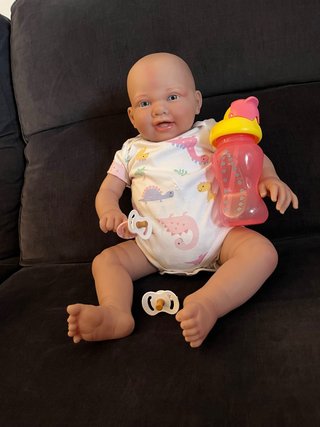 Bebé Reborn realista 2.3kg con ropa de su talla