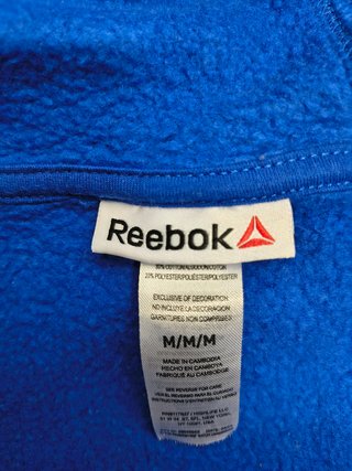 REEBOK Royal Blue c/capucha y bolsillo canguro.