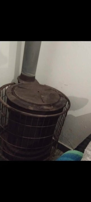 Chimenea de hierro antigua