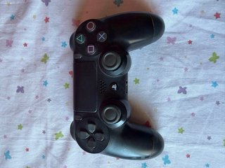 Console PlayStation 4 (PS4) con controller e giochi