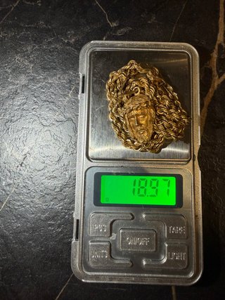 Cadena con Colgante de Rostro en Oro