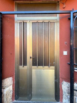 Puerta exterior de Aluminio con Cristal