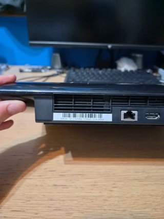 PS3 Super Slim 12GB con controller cavi e libretti