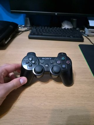 PS3 Super Slim 12GB con controller cavi e libretti