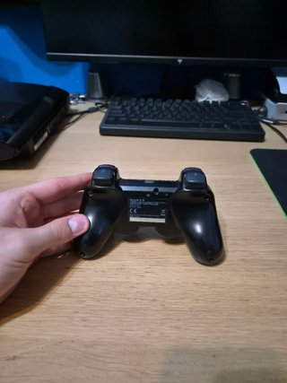 PS3 Super Slim 12GB con controller cavi e libretti