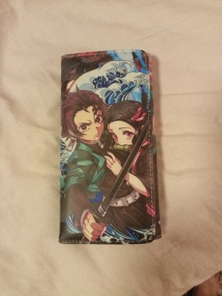 Monedero Anime Multicolor. El amarillo de regalo.