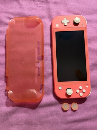 Nintendo Switch Lite Coral + Juegos