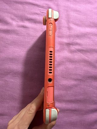 Nintendo Switch Lite Coral + Juegos
