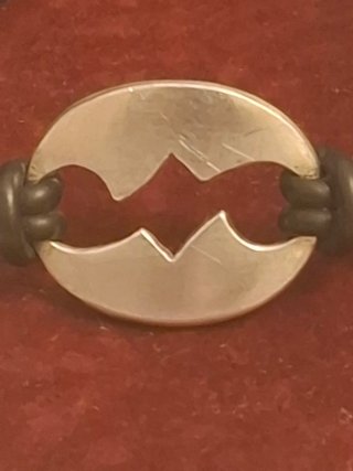 Pulsera cuero y plata diseño rompecabezas