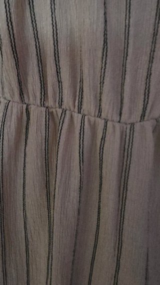 Mono de rayas beige