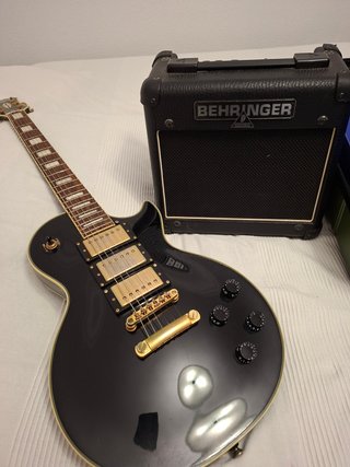 Guitarra Eléctrica Epiphone Black Beauty + Ampli