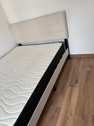 Cama con cabecero tapizado 150cm