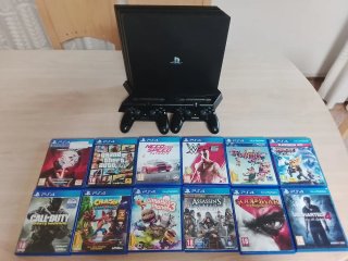 PlayStation 4 (PS4) con 2 mandos y 12 juegos