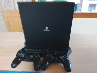 PlayStation 4 (PS4) con 2 mandos y 12 juegos