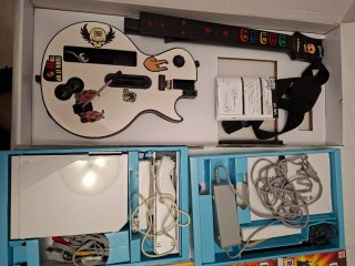 Consola Nintendo Wii con Guitarra y 8 Juegos