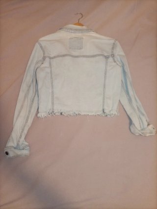 Chaqueta vaquera desgastada