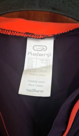 Chaqueta cortavientos Kalenji azul y naranja