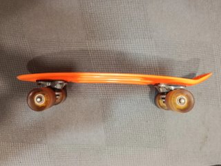 Monopatín tipo Penny Naranja