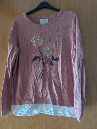 Jersey rosa con flores y volantes talla L