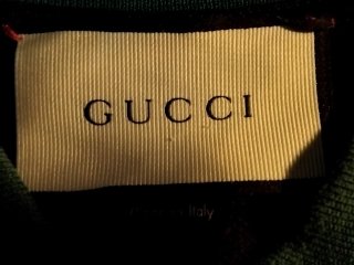 Polo Negro Gucci de piqué con cuello Web