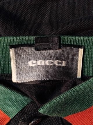 Polo Negro Gucci de piqué con cuello Web