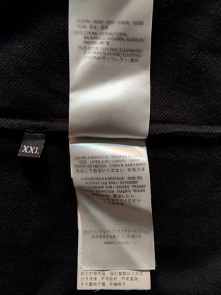 Polo Negro Gucci de piqué con cuello Web