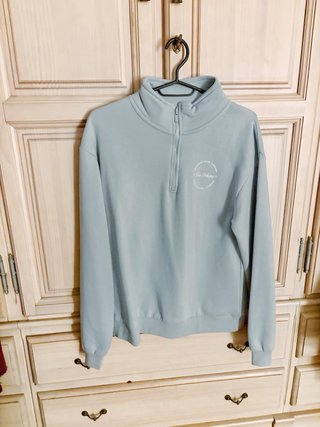 Sudadera cuello alto cremallera azul