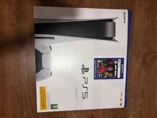 PlayStation 5 (PS5) con 2 mandos y 3 juegos