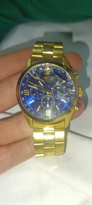 Reloj Lotus Dorado y Azul original