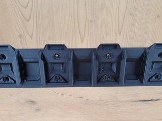 Soporte de pared para baterías Parkside