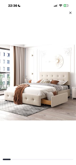 Cama tapizada beige con cajones