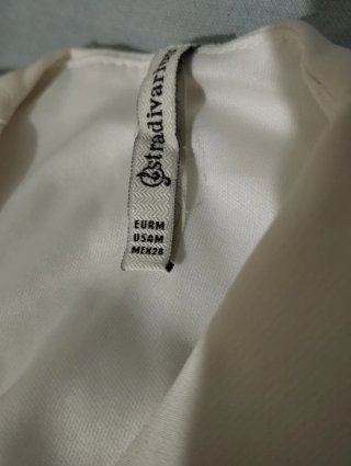 Mono Blanco Stradivarius