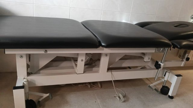 Cama de trabajo ajustable