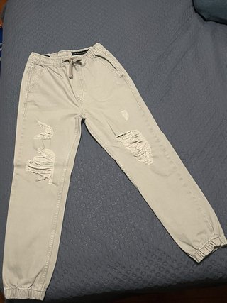 Pantalones Jogger gris  con Roturas