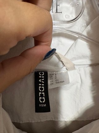 Casaco acolchoado e felpudo bege/branco