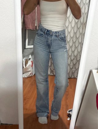 Calças jeans azuis largas