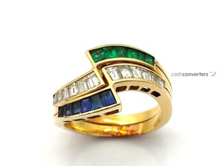 anillo oro 18k con piedra con aguamarina,circonita,esmeralda