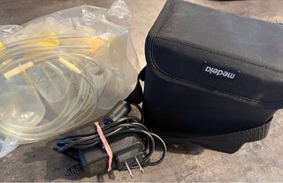 Tiralatte Medela con accessori PRESA AMERICANA