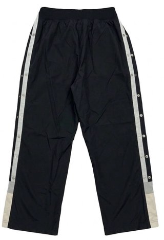 Pantalones Nike negros con botones laterales