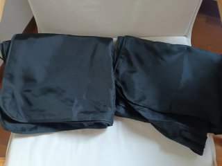 Dos Bolsas protectoras de nailon para abrigos y tr