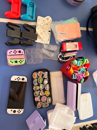 Nintendo Switch OLED Blanca + muchos accesorios